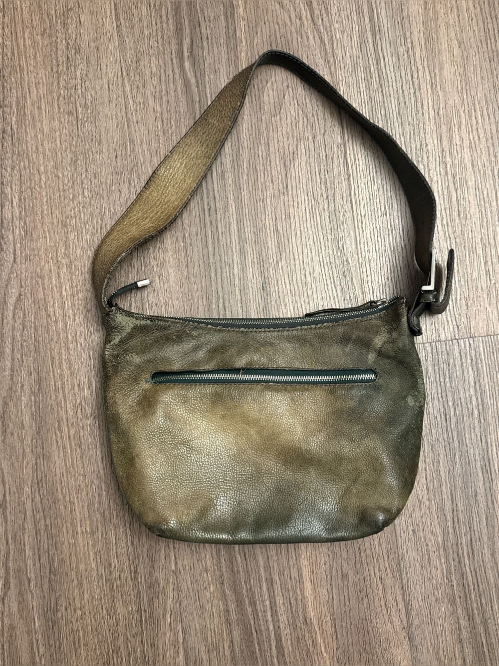 Vintage, distressed, brown, genuine leather should bag with pebbled texture.